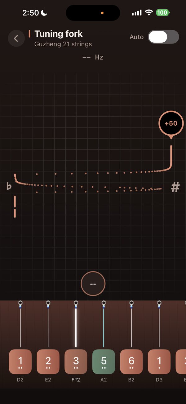 Tuning fork screen showing the pitch trace and cents offset for Guzheng 21 strings